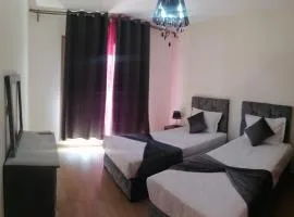 An elegant apartment for rent with a pool and a view of the mountains in Marrakesh