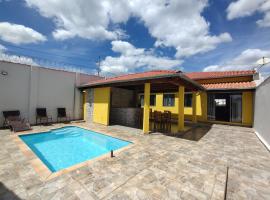 Pouso Oliveira Casa com ar condicionado, дом для отпуска в городе Сан-Жуан-Батиста-ду-Глория