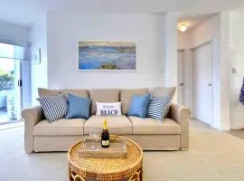 Beautiful, modern apartment seconds from beach