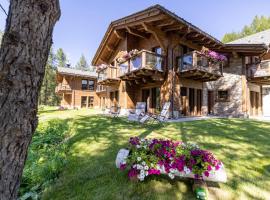 Chalet Imbosc'ché - 5 beautiful rooms in charming B&B, B&B i Livigno