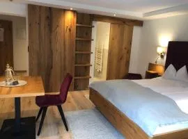 Hotel Garni Central - Zimmer - Studios - Apartments