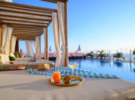 Carlton Tel Aviv Hotel – Luxury on the Beach: bir Tel Aviv, Tel Aviv Promenade oteli