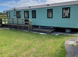 Garej Mynytho Caravan, cottage a Pwllheli