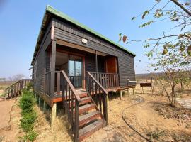 Porcupine Cabin, מקום אירוח ביתי בPalapye