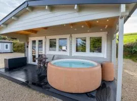 Luxury Log Cabin with Private Hot Tub & Sea Views