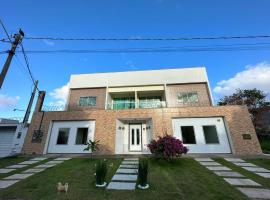 Aptos Luxo completo 2 e 3 quartos em Guriri 300 mts da praia Wi-fi grátis, Hotel in Guriri