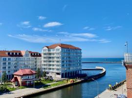 Apartamenty Marina z widokiem na morze, khách sạn ở Darlowko
