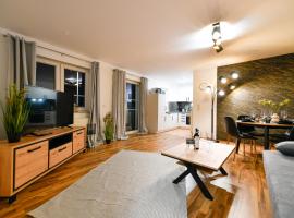 Exklusives-City-Apartment mit gratis Tiefgarage, Balkon, Waschtrockner, Netflix, apartment in Cottbus