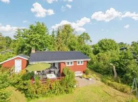 4 person holiday home in Grenaa