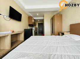 Skyview Premier Suites Hozby, hotell i Sunggal