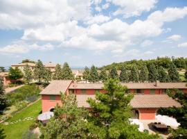 Luxury Resort with swimming pool in the Tuscan countryside, apartments with private outdoor area with panoramic view, serviced apartment in Osteria Delle Noci