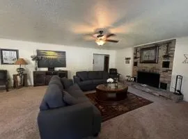 JI13- ,A two bedroom, one bath house with den, covered outdoor dining area and fenced in yard at our Joplin Inn home