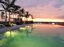 Infinity pool apartment with stunning sunset view - GM Remia Residence Ambang Botanic, family hotel in Klang