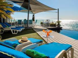 185 on BEACH Boutique Suites, apartmen di Gordonʼs Bay