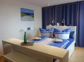 Ferienhaus am See mit Ruderboot
