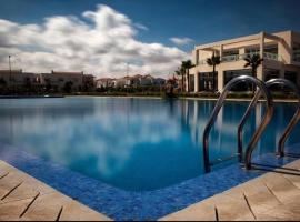 Appartement à savannah beach, residence balnéaire, hôtel avec parking à Dar Hamida