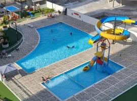 Hermoso apartamento con piscina ubicado cerca a los principales centros comerciales, מקום אירוח ביתי באיבגה