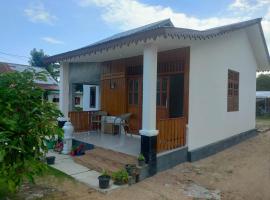 Homestay Melty Aprianti Tanjong Tinggi, maison d'hôtes à Pasarbaru