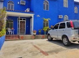 BELLA SUITE frente al Aeropuerto, hotel with parking in Catia La Mar