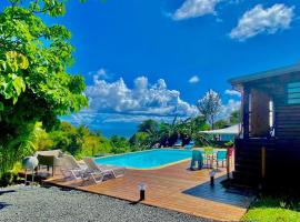 Bungalow Le Bombax - Vue mer-Plage à 5mn - Piscine, nastanitev ob plaži v mestu Saint-François