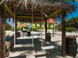 Parrot-ise 4 Bedroom Villa, Hotel mit Pools in Brinkleys