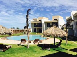 Vista do paraíso AP 09 Condomínio vilas na Praia Residente, khách sạn ở Canoa Quebrada