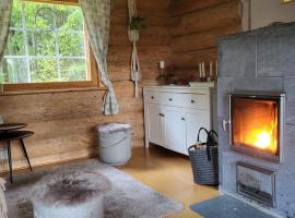 Hirsitalo ja -sauna, puhkemaja sihtkohas Nummi