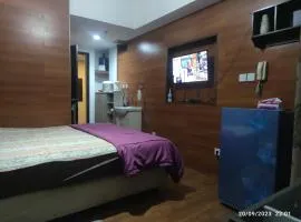 Grand Dhika Apartement by 2325 Studio room with cozy wooden style room