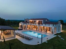 Wunderschöne Villa mit beheiztem Pool, Sauna und Whirlpool in der Nähe des Meeres, vacation home in Hrboki