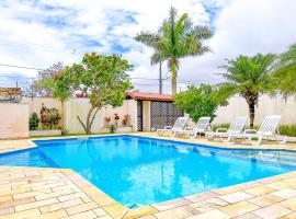 Casa com churrasqueira e piscina em Itanhaem, hotel in Itanhaém