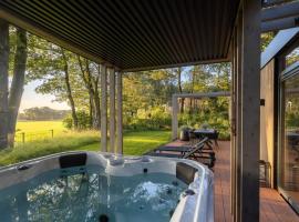 Zicht op Twente - Spa lodges、マルケローのホテル