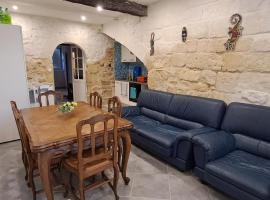 Grande maison traversante.