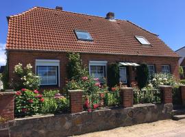 Strandwind holiday home with winter garden on the Baltic Sea, holiday rental in Dannau
