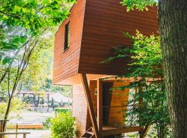 Utopia Village - Art & Nature Lodges, lodge à Jurbise