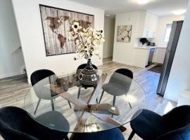 Walking distance to St Boniface, easy parking, cabaña o casa de campo en Winnipeg