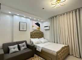 Bamboo Bay with Wifi & Pool Condotel, апартамент на хотелски принцип в Мандау Сити