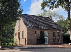 Evergreen wellness met sauna & hottub, cheap hotel in Ewijk