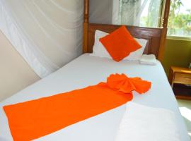 Roma Stays - Elegant Apartment at Sunset Paradise with Swimming Pool & Restaurant, resort en Mombasa