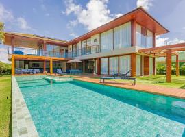 PF16 Casa Alto Luxo 5 Suítes Praia Bella Diarista Inclusa，位于普拉亚多的酒店