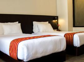 Hotel Bhutan Ga Me Ga โรงแรมที่มีที่จอดรถในฟูนท์โซลิง