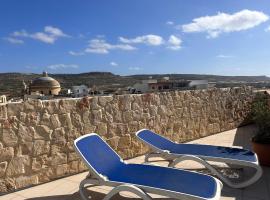 Claureece Court Mgarr, proprietate de vacanță aproape de plajă din Mġarr