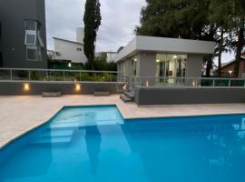 Departamento nuevo con seguridad y pileta ,en villa allende a 15 del centro de Córdoba, vacation rental in Villa Allende