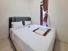 RedDoorz Syariah at Galliano Homestay Bukittinggi, hotel v destinaci Bukittinggi