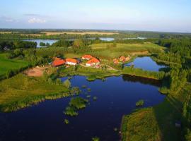 Siedlisko Konradówka, farm stay in Olecko