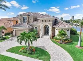 Opulent waterfront home with pool, spa, dock and deck