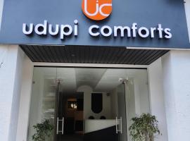 Udupi Comforts، فندق في أودوبي
