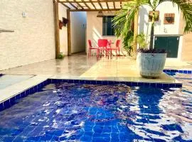 Linda Casa com piscina e totalmente climatizada Airbn b