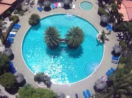 Kas di BaMi A-186 op Seru Coral Resort - Ruim appartement met groot zwembad en tropische tuin