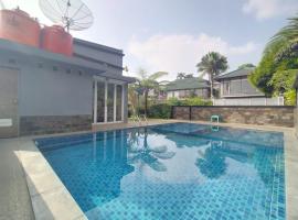 Villa Bukit Danau Lot 14、Cinengangirangの別荘