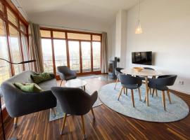 Apartment direkt am See mit Balkon und Kamin - Wiesengeflüster, pet-friendly hotel in Klink